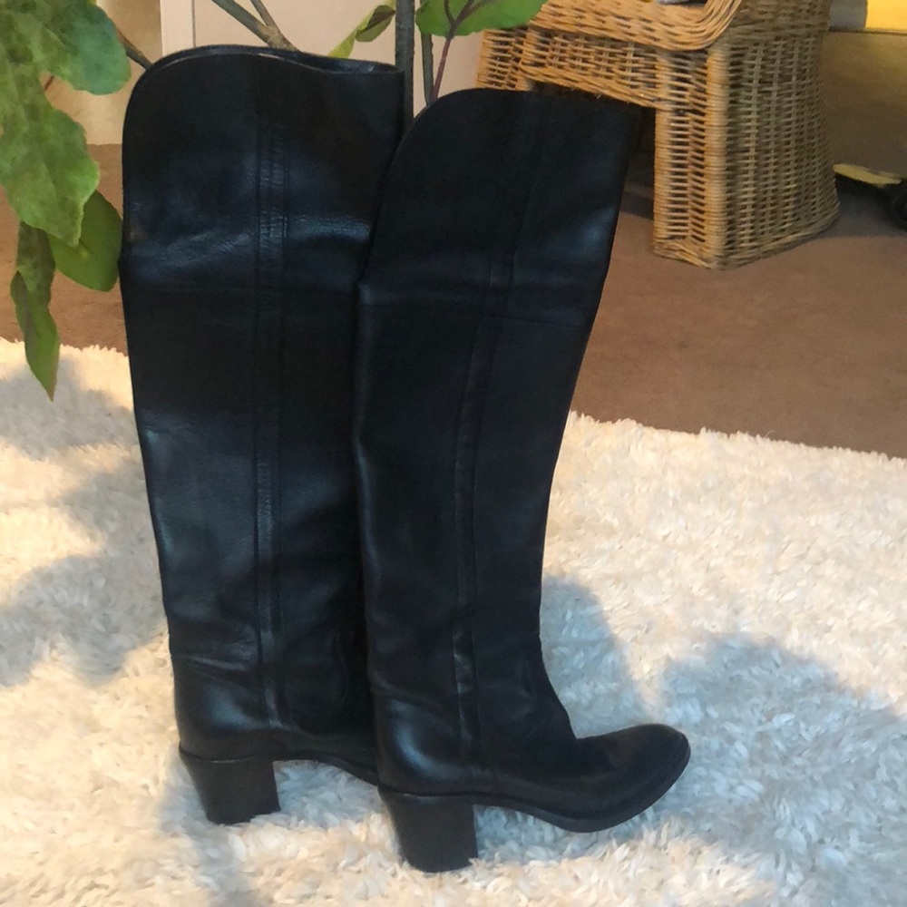 Black leather knee high boots